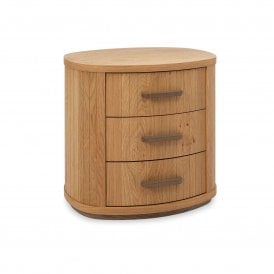 The Bentley Designs Vega 3 Drawer Nightstand combines contemporary design with crafted character. Finished in knotty oak veneers with a soft weathered tone, it features subtle curves, expressive grain, and delicate groove detailing. Three soft-close drawe